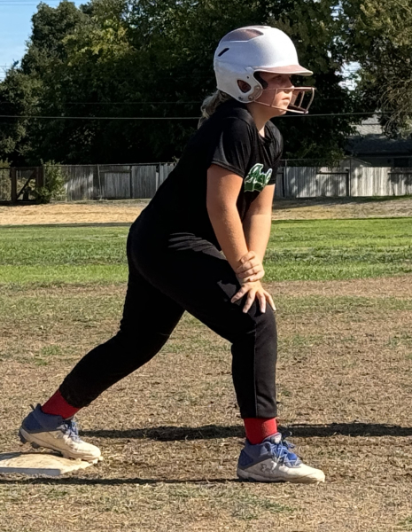 My daughter ready to score a run from third base.